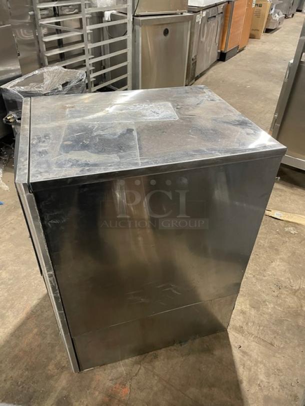 Hoshizaki stainless steel ice machine, model KM-650MAH, air-cooled, electric, crescent cube style, condition visible.