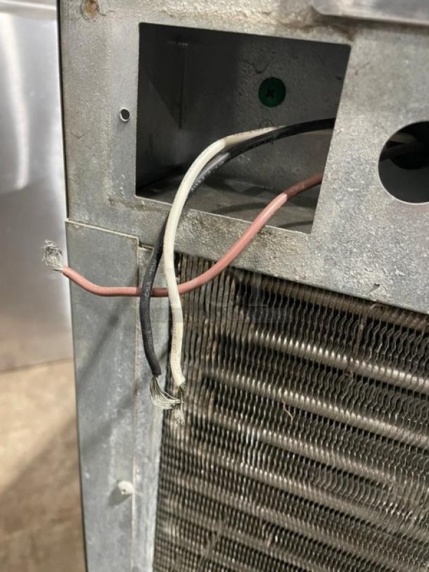 Hoshizaki KM-650MAH commercial ice machine head, showing wiring and coil components. Model KM-650MAH, SN: A16373K.