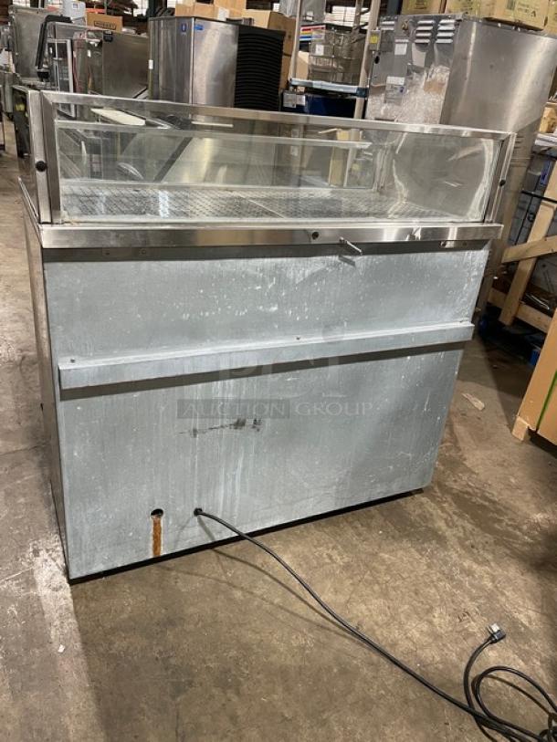 Glastender stainless steel bar back cooler, model FV48XS(LR), with enclosed top display, 120V 1 Phase, visible wear.