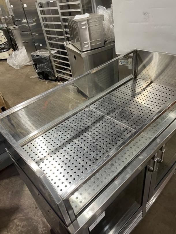 Glastender FV48XS(LR) stainless steel bar back cooler with enclosed top display, 120V, 1 Phase, excellent condition.