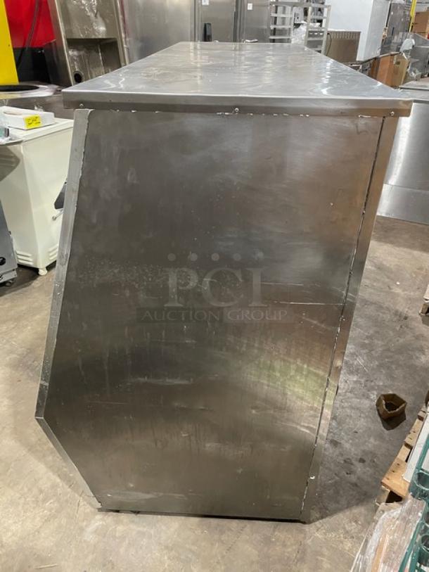 Leader HDL72SC Stainless Steel Refrigerated Merchandiser, slanted glass top, rear sliding doors, adjustable shelving, good condition.