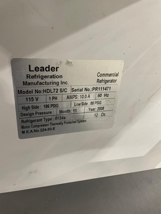 Leader stainless steel refrigerated merchandiser model HDL72SC with slanted glass, adjustable shelving, and sliding doors.