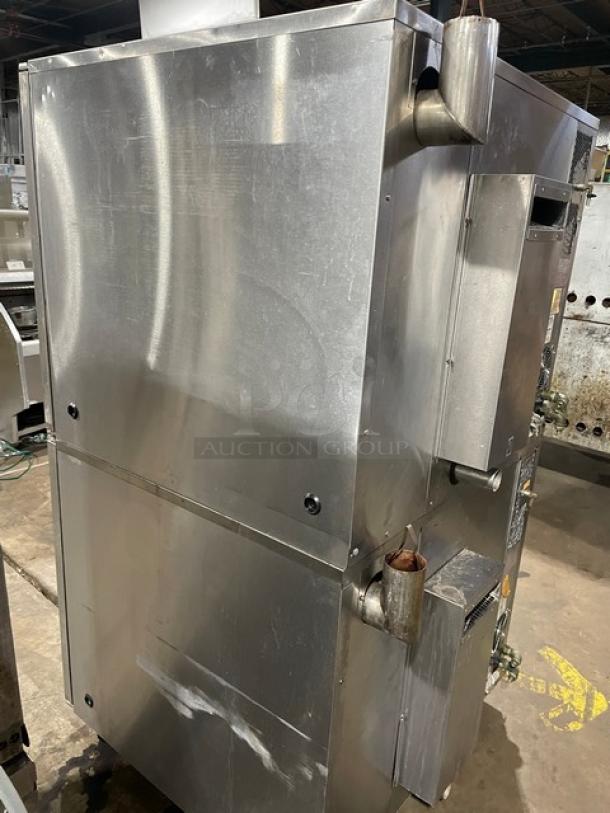 Blodgett commercial stainless steel double-stacked convection oven, natural gas powered, with digital controls, wired rack, on casters.