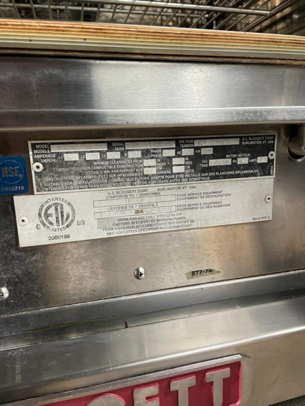 Blodgett commercial stainless steel double-stacked convection oven with digital controls, wired rack, and casters. NSF certified.