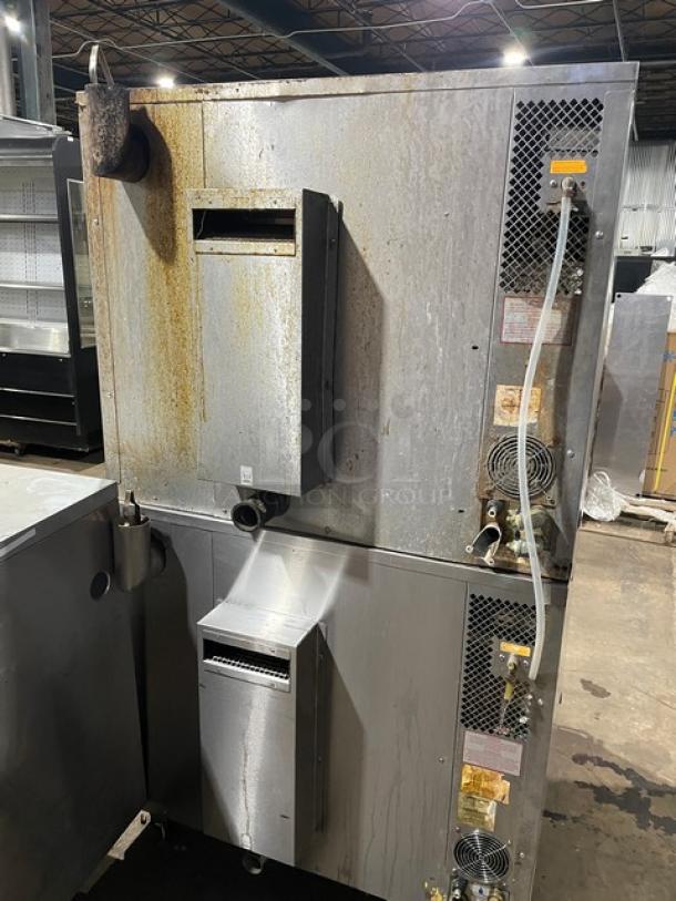 Blodgett commercial stainless steel double stacked convection oven, natural gas, digital controls, wired oven rack, on casters.