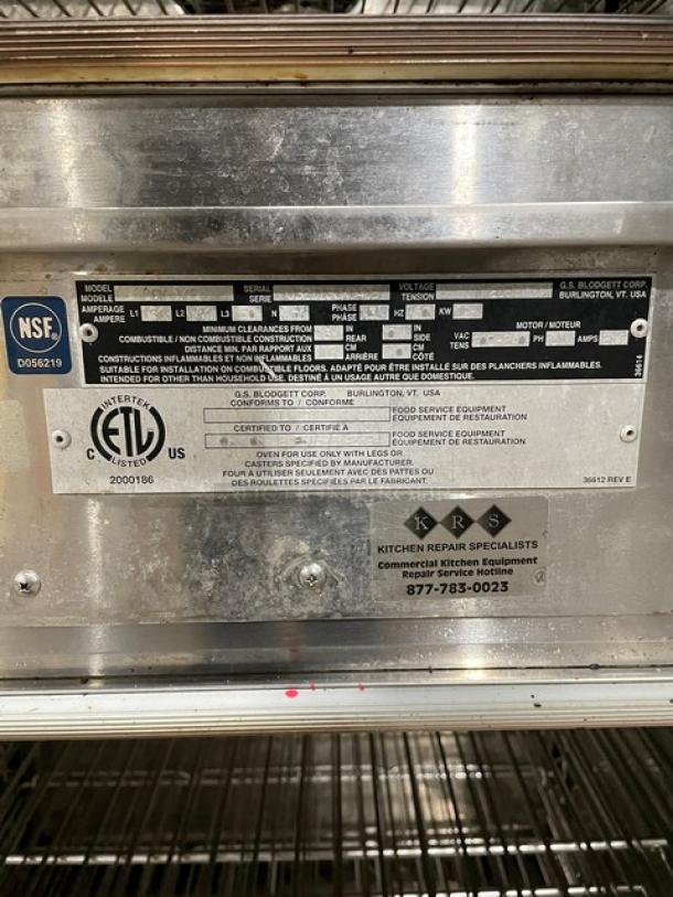 Blodgett commercial stainless steel double stacked convection oven, natural gas powered, with digital controls and wired rack.