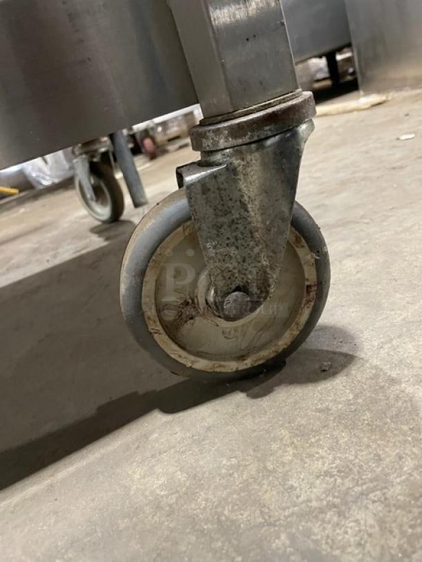 Caster wheel of AccuTemp Evolution Series stainless steel convection steamer, showing sturdy build and mobility feature.