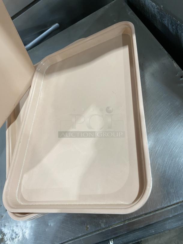 Camtray commercial tan fast food/serving tray, durable, lightly used, stackable design, ideal for restaurants.
