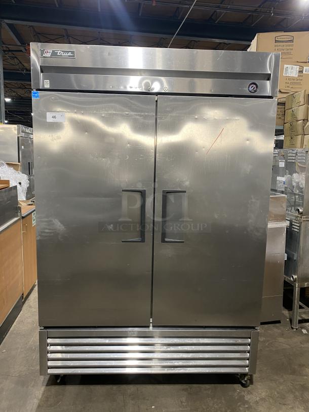 True T-49F stainless steel 2-door reach-in freezer, Energy Star certified. Features poly coated wired racks, on casters.