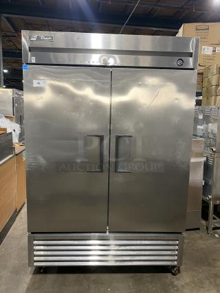 True T-49F stainless steel 2-door reach-in freezer, Energy Star certified. Features poly coated wired racks, on casters.