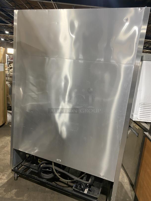 True T-49F Commercial Stainless Steel 2-Door Reach-In Freezer, Energy Star Certified, on Casters, with Poly Coated Racks.