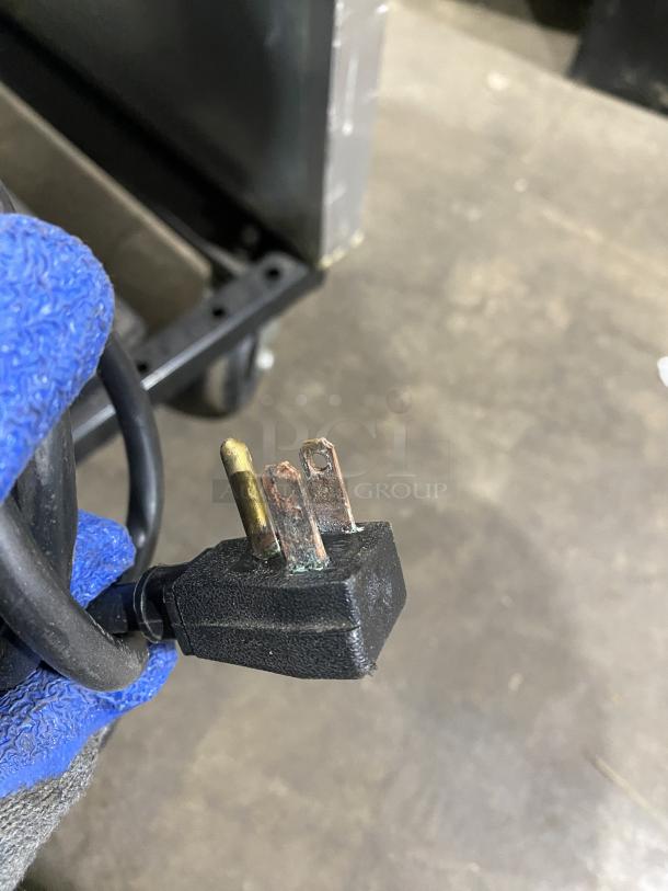 True T-49F commercial stainless steel 2-door reach-in freezer, Energy Star certified, on casters, 115V, 1 phase plug.