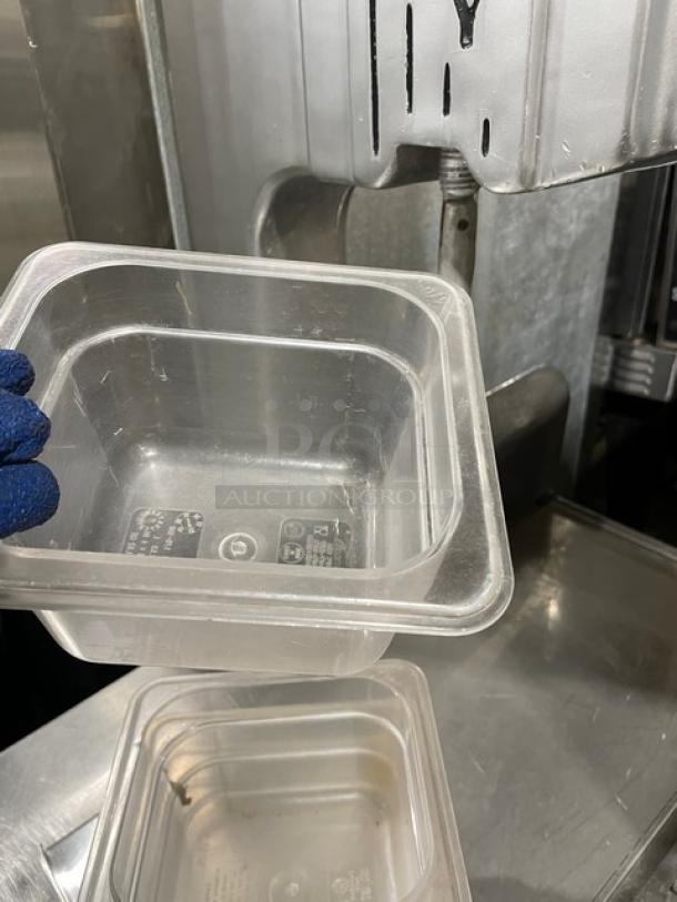 Characin clear polycarbonate 1.62 Qt food storage container, durable, commercial-grade, features measurement markings.