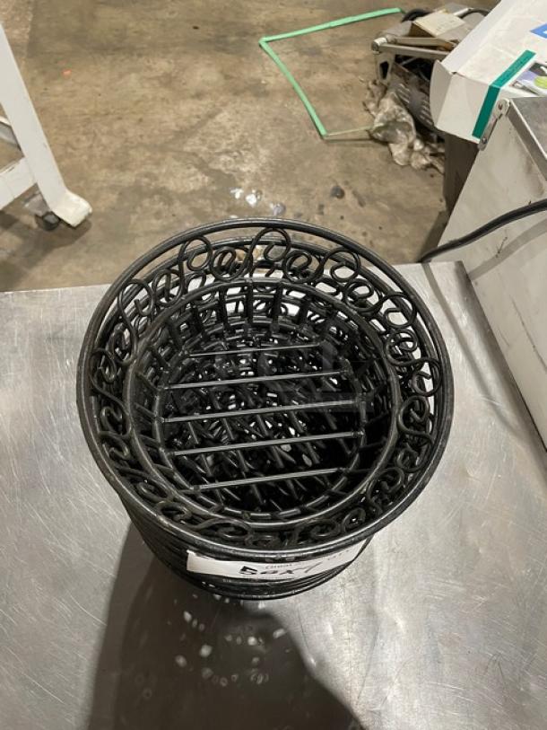 Commercial black round wired basket, 9-inch diameter, sturdy iron construction, intricate design, excellent condition.
