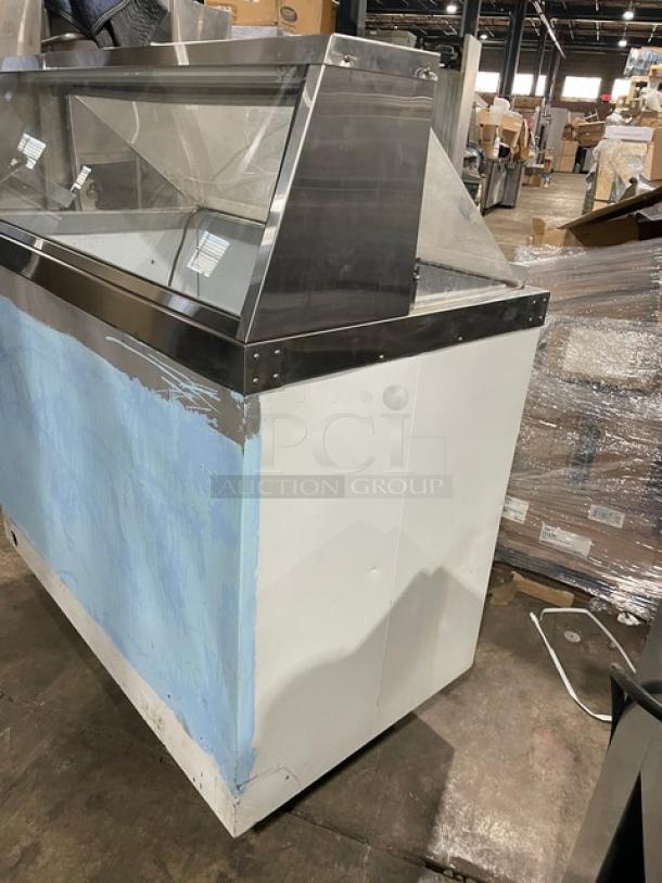 Master-Bilt commercial white ice cream dipping cabinet with sneeze guard, 115V. Features metal frame, visible wear.