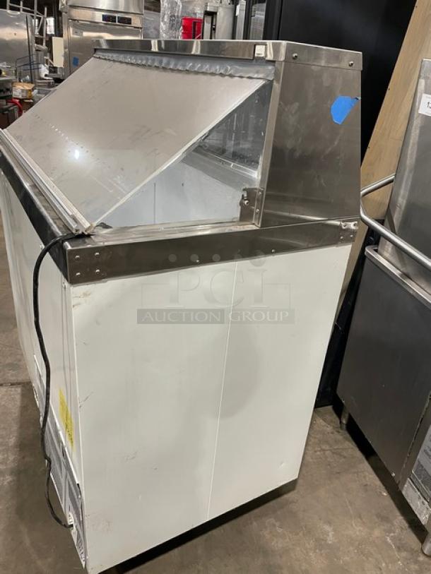 Master-Bilt commercial white ice cream dipping cabinet with sneeze guard, 115V, durable condition, ideal for display.