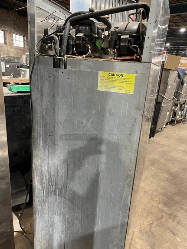 Hoshizaki RFH1-SSB-HS stainless steel half door refrigerator/freezer combo with digital controls, on casters, shown from the back.