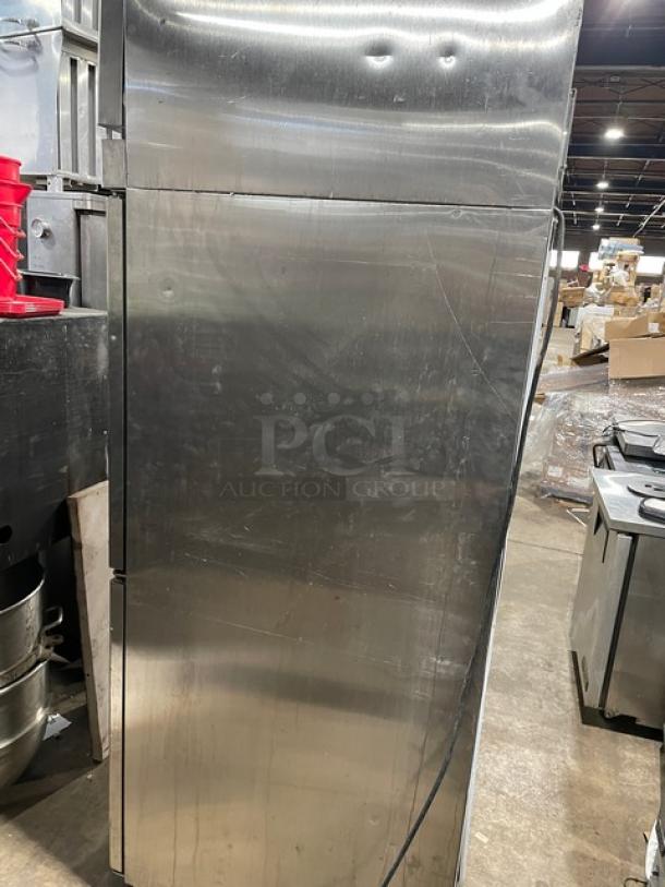 Hoshizaki RFH1SSBHS commercial stainless steel half door refrigerator/freezer, digital controls, on casters, visible dents.