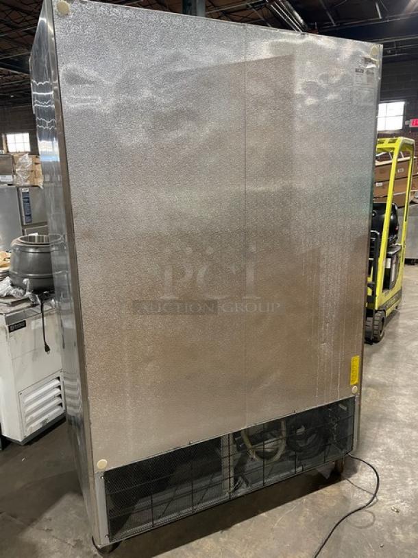 Arctic Air AF49 stainless steel 2-door reach-in freezer, commercial use, model 311709, on casters, 115V, good condition.