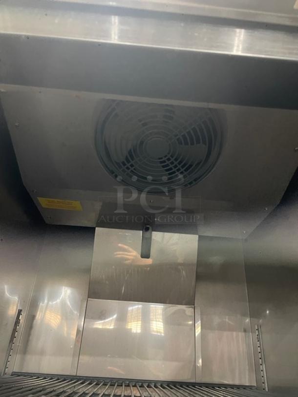 Berg EDRF23BERG stainless steel reach-in freezer interior, showing wired rack and digital controls. Model EDRF23BERG, on casters.