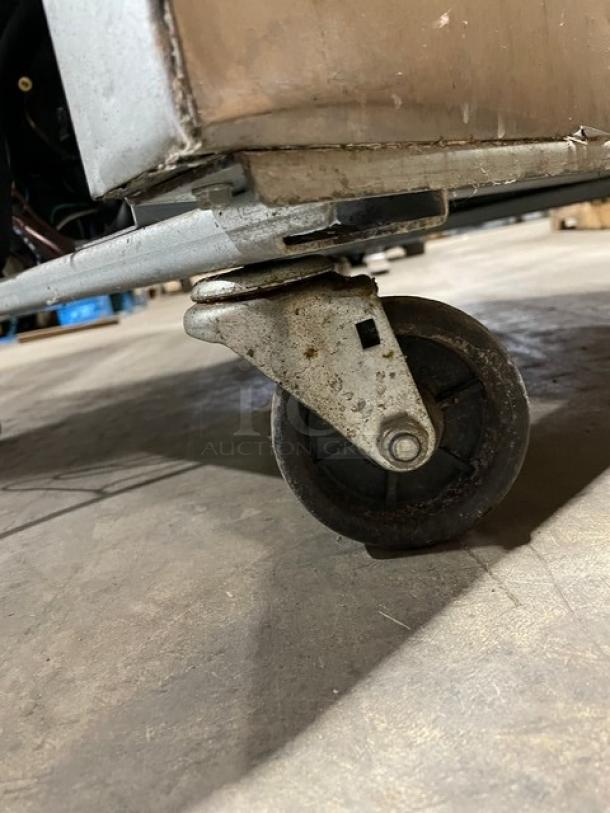 Berg Commercial Stainless Steel Freezer caster wheel. Model EDRF23BERG. Durable condition.