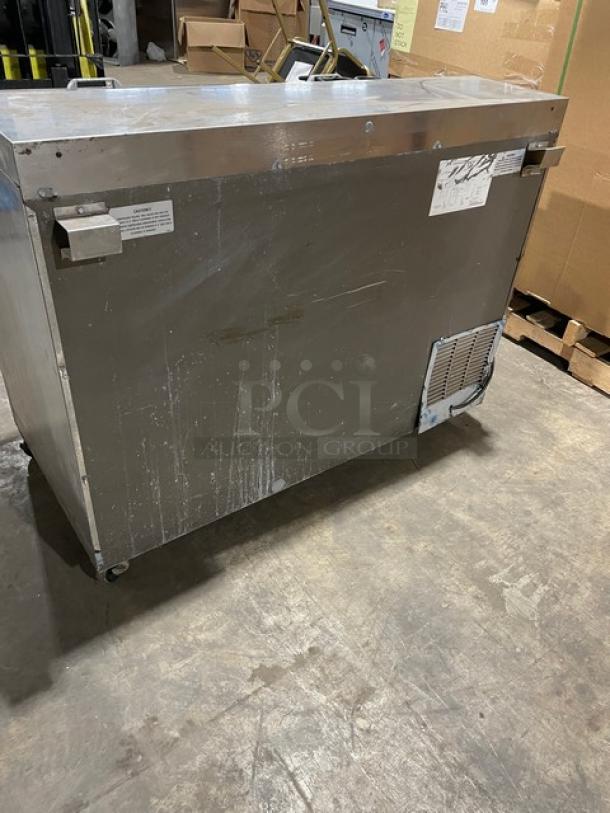 Perlick FR48-STK commercial stainless steel bar back glass chiller/froster, 115V, 1 phase, on casters, visible wear.