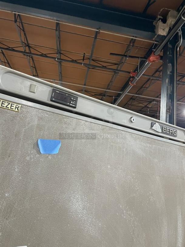 Berg Commercial Stainless Steel Single Solid Door Reach-In Freezer, Model BVEF23, with poly coated wired rack, on casters.