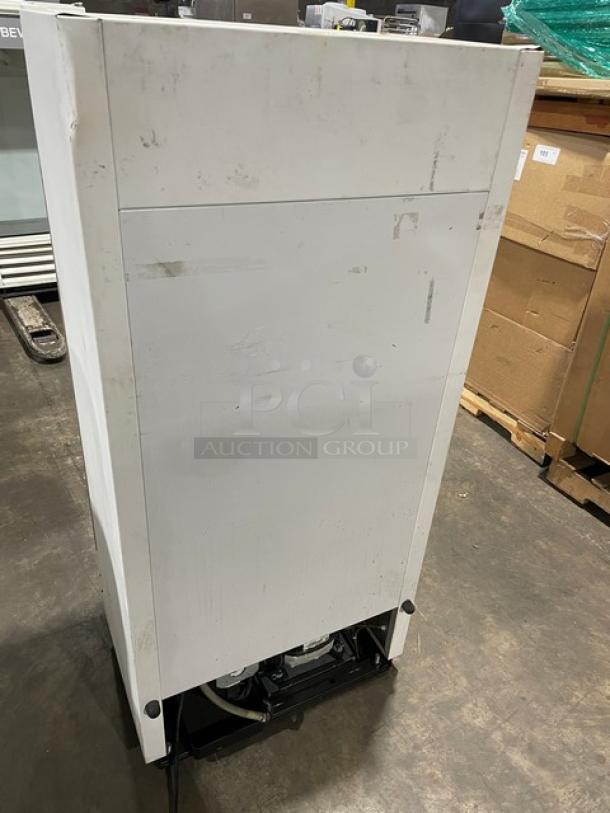True GDM-10SSL-LD commercial refrigerator, white, single glass door, 115V, used condition, model and serial label visible.