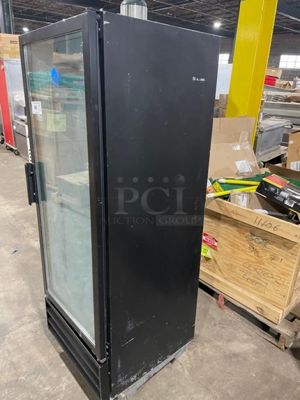 Beverage Air MT12 commercial black single glass door merchandiser cooler, 115V, model MT12, visible wear, sturdy build.