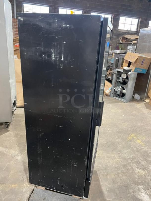 Beverage Air MT12 commercial black single glass door cooler, model MT12, 115V, fair condition with visible scratches.