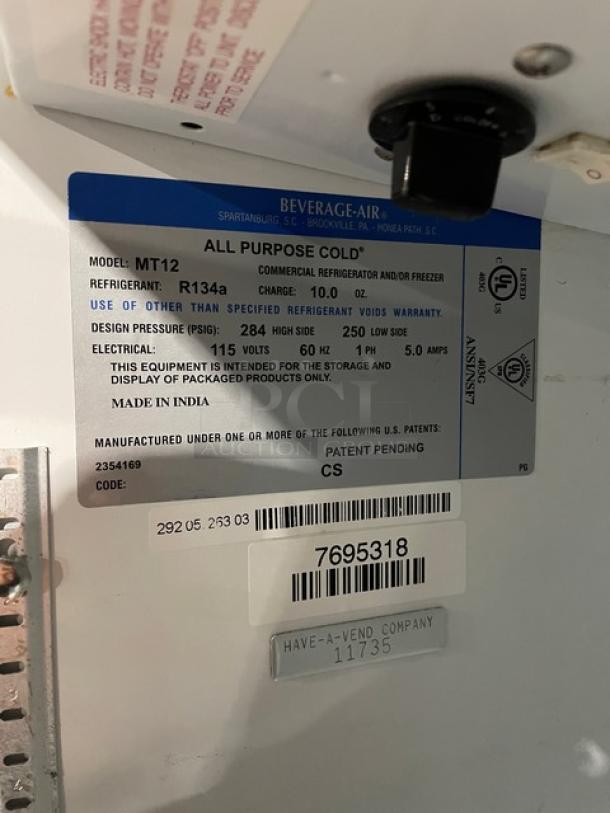 Beverage Air MT12 commercial cooler label, model specifics, and SN 7695318. Features 115V 1 Phase, for packaged product display.