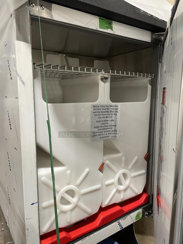 Brand new Franke F3D3P Frozen French Fry Dispenser on pallet, ideal for high volume, visible instructions on front.