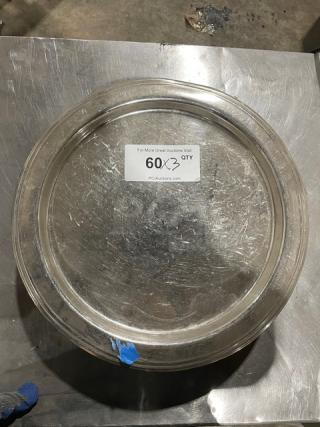 Commercial stainless steel plate, round, with visible scratches, quantity label indicating 60 units in the lot, sturdy condition.