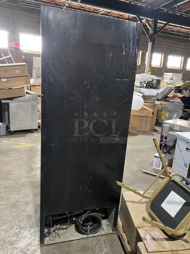 Beverage Air MT27 commercial glass door refrigerator, poly coated wired rack, condition shown with visible wiring, 115V, 1 Phase.