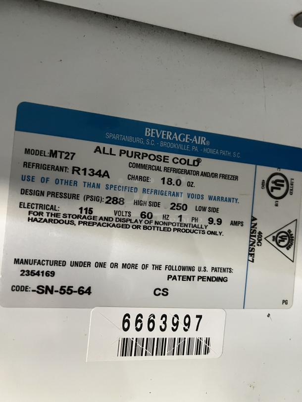 Beverage Air MT27 commercial refrigerator label detailing model, refrigerant R134A, voltage 115V, and serial number 6663997.