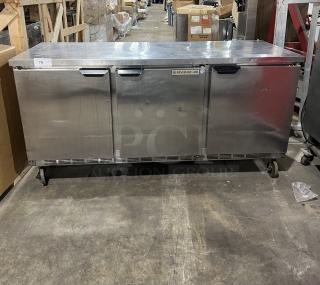 Beverage-Air commercial stainless steel 3-door 72" worktop refrigerator, model WTR72AY, on casters, pre-owned condition.