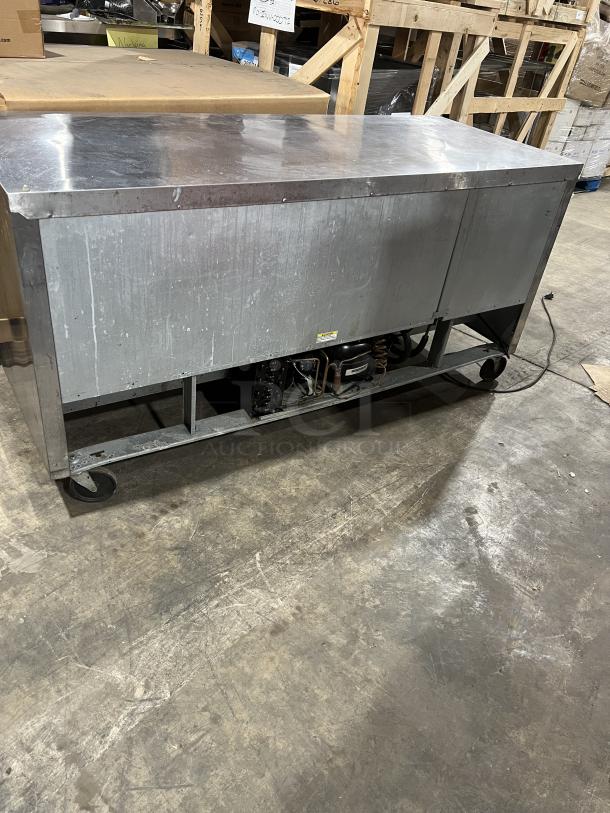 Beverage-Air Stainless Steel 3-Door Worktop Refrigerator, Model WTR72AY, on casters, flat-top, commercial use.