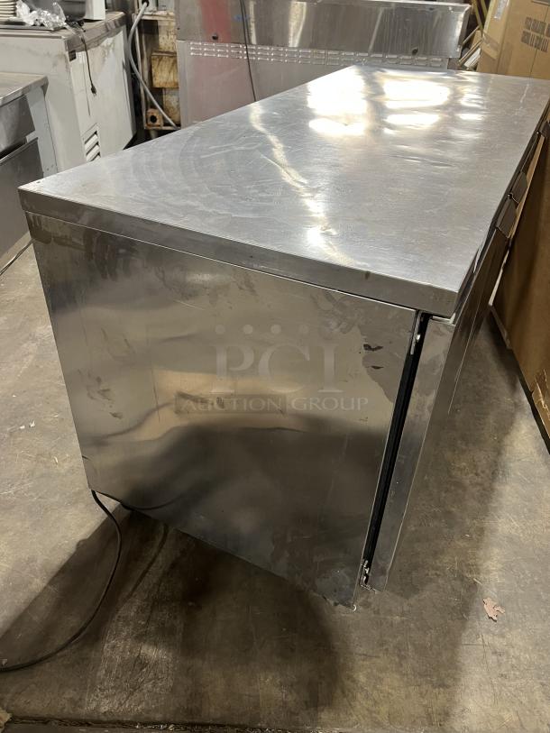 Beverage-Air commercial stainless steel 3-door 72" flat-top worktop refrigerator, model WTR72AY, on casters, used condition.