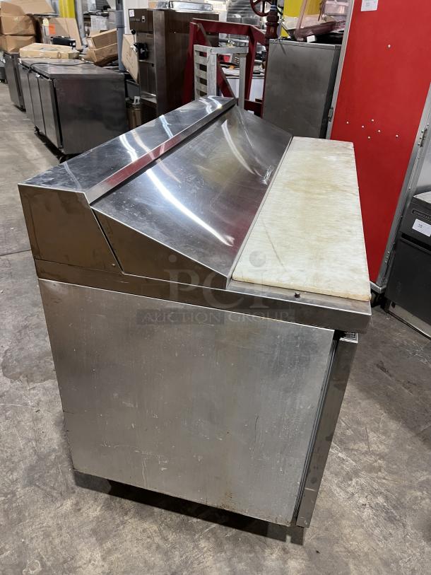 Continental Commercial Stainless Steel Sandwich Prep Table, Model SW60-16, dual door, with cutting board, used condition.