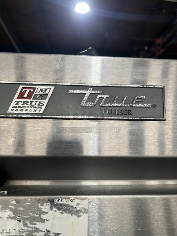 True T-19F commercial freezer, stainless steel, single door, poly coated racks, on casters, 115V, model plate visible.