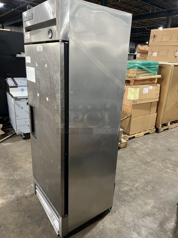 True T-19F commercial reach-in freezer, stainless steel, single door, poly coated racks, on casters, lightly worn.