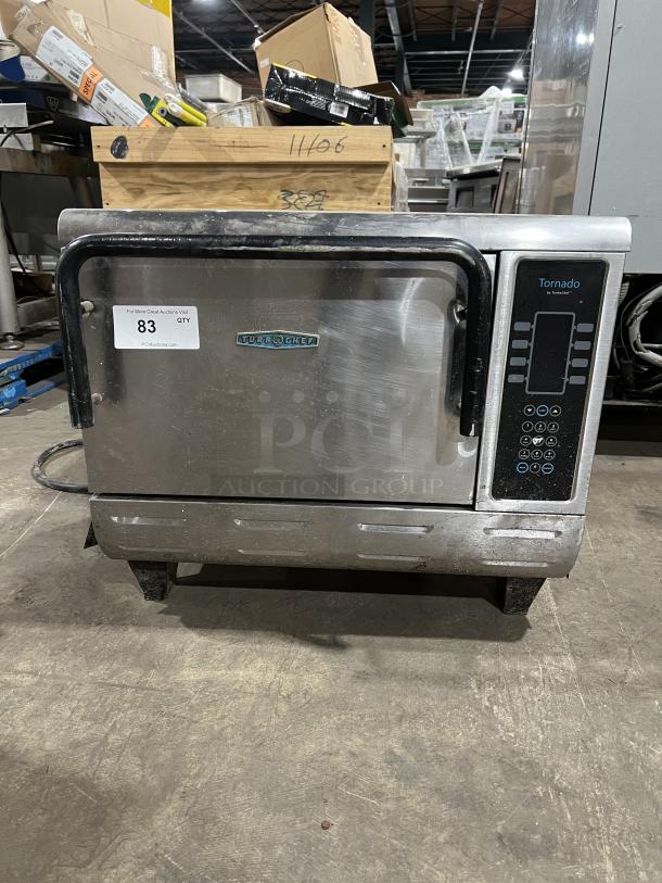 TurboChef stainless steel electric countertop oven, ventless, with digital controls. Slight wear visible. Model: Tornado.