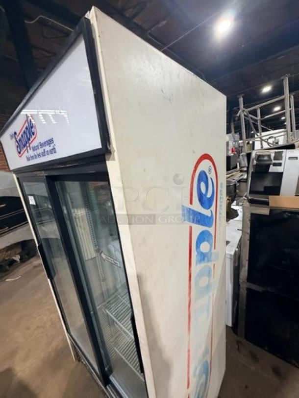 True GDM45 glass sliding door cooler merchandiser with Snapple branding. Used condition, 115V, 1 Phase.