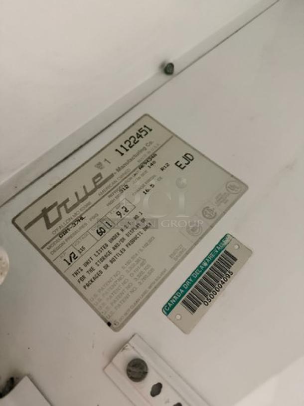 True GDM45 cooler label, showing model, serial number 1122451, voltage 115V, 1 phase. Ideal for commercial use.