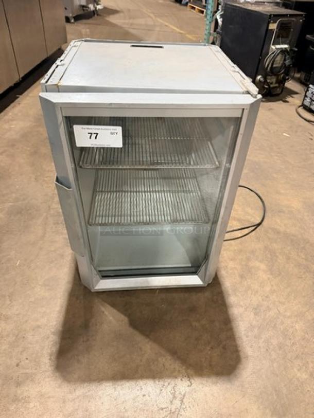 Commercial stainless steel RedBull beverage cooler, Model RBGDCT, single glass door, countertop LED, used condition, 115V.