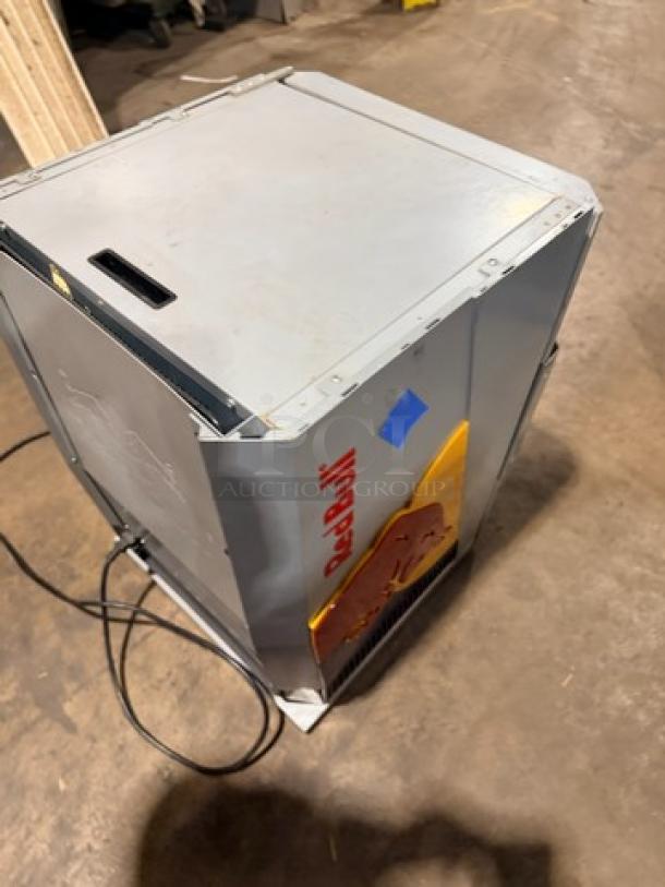 Commercial stainless steel RedBull-style beverage cooler with single glass door and LED lighting. Model: RBGDCT.