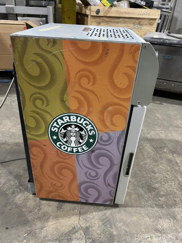 Starbucks Cold Masters CT200 countertop cooler, 115V, 1 phase, colorful design, visible scratches, used condition.