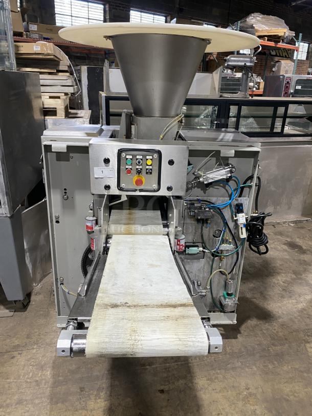 Benier commercial stainless steel industrial dough divider, used, with control panel and conveyor belt.