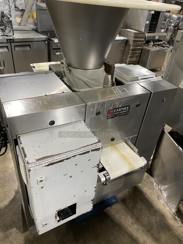 Benier stainless steel industrial dough divider for bakeries, with "Empire Bakery Equipment" label, in used condition.