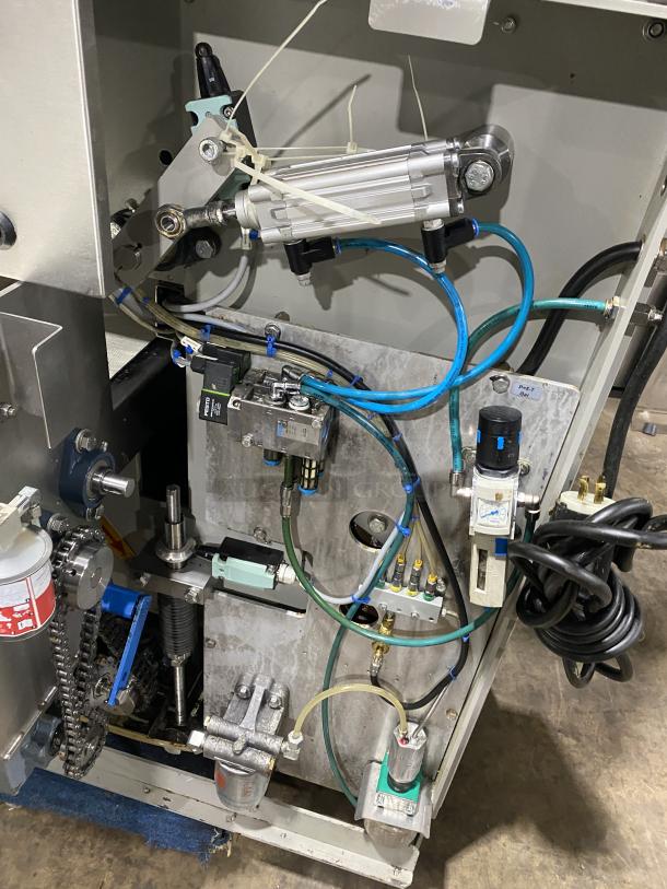 Benier stainless steel industrial dough divider machine with visible components and wiring, used, in good condition.